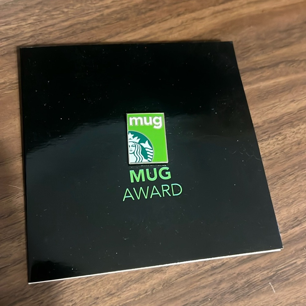 Starbucks mug award pin with paper